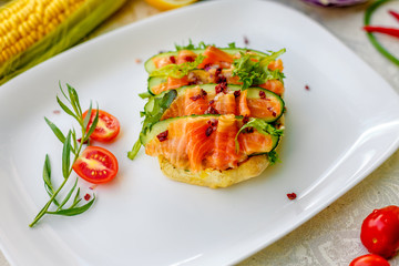 sandwich with bread fish and cucumber