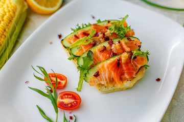 sandwich with bread fish and cucumber