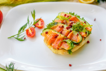 sandwich with bread fish and cucumber