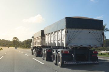 Double semi-trailer truck on the road