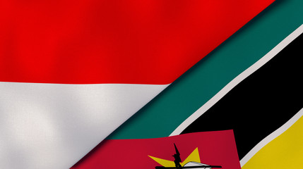 The flags of Indonesia and Mozambique. News, reportage, business background. 3d illustration