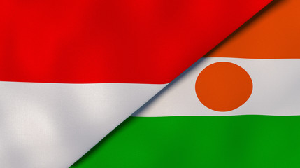 The flags of Indonesia and Niger. News, reportage, business background. 3d illustration