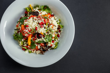 vegetarian salad healthy food with pomegranate cheese and pepper