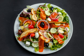 salad with fresh fish arugula and cheese