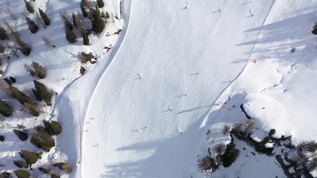 Aerial top down View of Nassfeld Ski Resort in Austrian province of Carinthia with Skiers on slopes