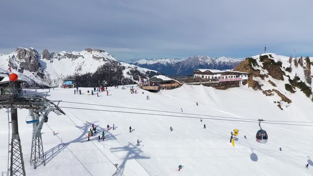 Aerial Landscape View of Nassfeld Ski Resort in Austrian province of Carinthia with Ski Lift and Skiers on slopes