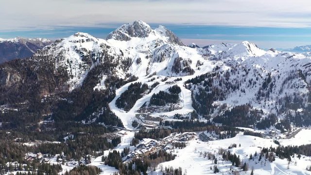 Aerial Landscape View of Nassfeld Ski Resort in Austrian province of Carinthia with Skiers on slopes