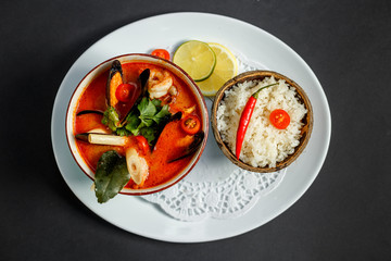 Thai spicy tom yam soup with seafood