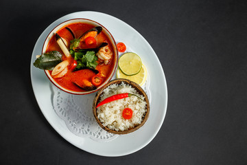 Thai spicy tom yam soup with seafood