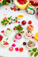 ice cream with fruits and different flavors (pistachio, chocolate, vanilla, cream)