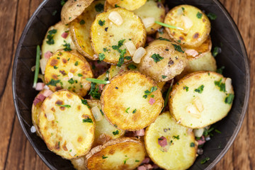 Fresh made Fried Potatoes (selective focus; close-up)