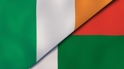 The flags of Ireland and Madagascar. News, reportage, business background. 3d illustration