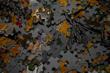Close-up of colorful pieces of puzzle. Stack of Puzzle Pieces. Puzzle pieces. Puzzle figures....