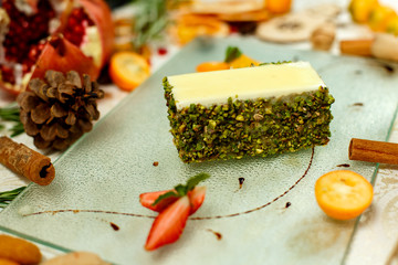 cheesecake with nuts and berries and ingredients served on the table