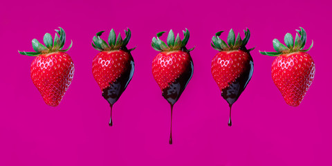 Strawberry photography session with solid purple pink background