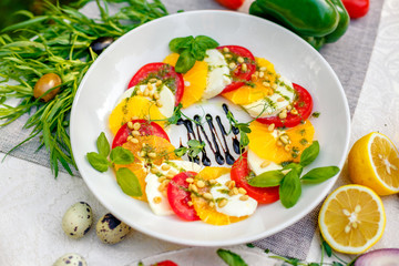 fresh vegetarian salad with greens and vegetables on the table, healthy food