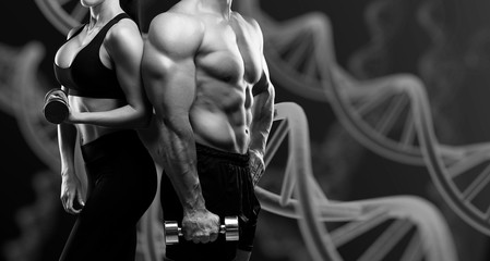 A young man with muscular torso and sporty woman on dark background