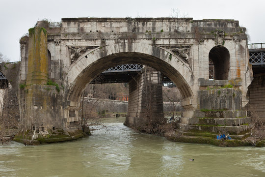 The Pons Aemilius (Ponte Emilio or Ponte Rotto). Oldest Roman stone bridge in Rome, Italy. View from Tiber Island