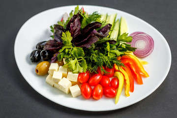 vegetable slices, cheese, tomatoes, peppers, greens, radishes, onions, cucumbersand olives, healthy food, isolated