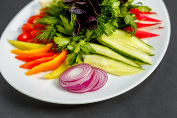 vegetable slices, cheese, tomatoes, peppers, greens, radishes, onions, cucumbersand olives, healthy food, isolated