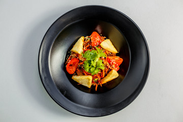 Thai salad with meat and soy sauce, isolated