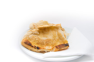 Popular brazilian bread with melted butter called pao na chapa. Pao na chapa traditional brazilian breakfast. Glass of hot coffee with milk called pingado. 