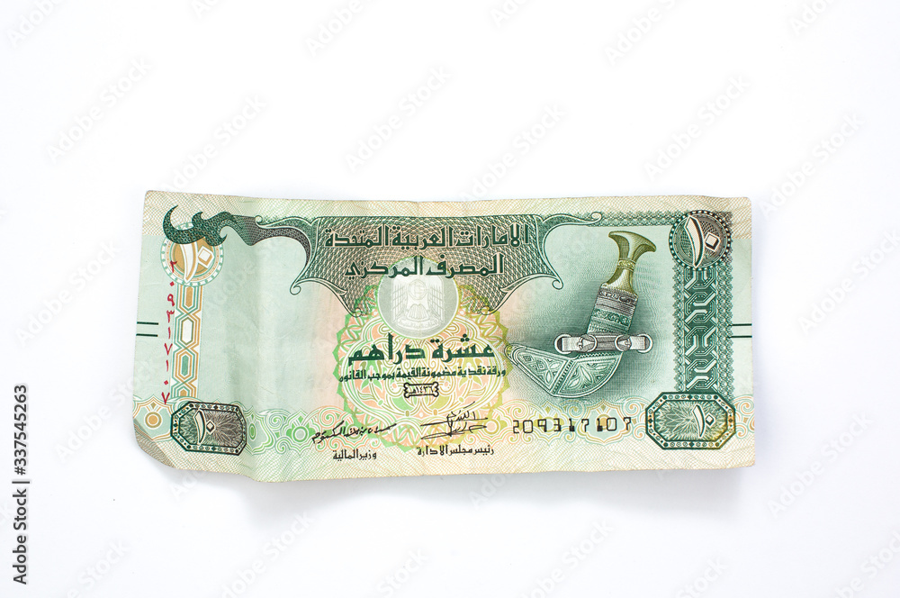 Wall mural united arab emirates ten dirham banknote, uae emirati money closeup