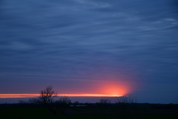 Sunset in a Cloudy Sky