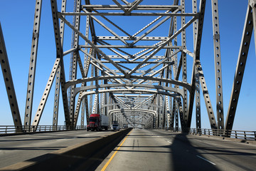 Fototapeta na wymiar steel bridge with blue sky background