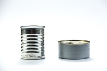 Pile of cans of conserved food over white background