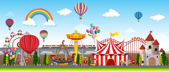 Themepark scene with many rides at day time