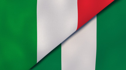Obraz premium The flags of Italy and Nigeria. News, reportage, business background. 3d illustration