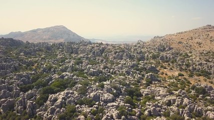 Panoramic aerial view of The Sierra del Torcal "El Torcal" montain Antequera.  This rocks had their origin in the seabed during the Jurassic period, between 250 and 150 million years ago. Foggy day