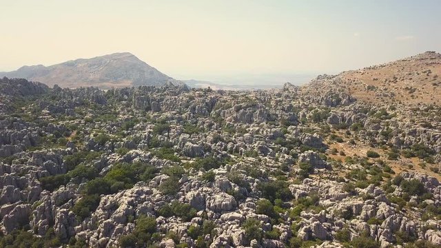 Panoramic aerial view of The Sierra del Torcal "El Torcal" montain Antequera.  This rocks had their origin in the seabed during the Jurassic period, between 250 and 150 million years ago. Foggy day
