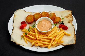 delicious nuggets with crispy fries and ketchup