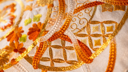 Macro close up on Japan traditional clothing kimono with beautiful embroidered pattern 