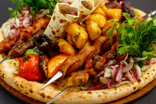 Assorted kebabs, Duck with fruit, Ribeye and Tibon steak, White Amur Koktal or rainbow trout, Baked leg of lamb