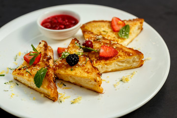 delicious toasts with cheese, fruit and raspberry jam, breakfast