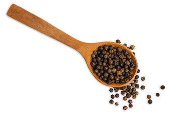 Dry Black pepper in a brown wooden spoon isolated on white background. Top view and clipping path.