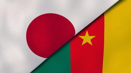 The flags of Japan and Cameroon. News, reportage, business background. 3d illustration