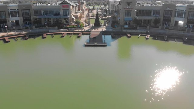 Aerial View of Towne Lake shopping center Boardwalk, Cypress, Houston, Texas.  Wide Shot, Push In, Tilt up