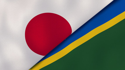 The flags of Japan and Solomon Islands. News, reportage, business background. 3d illustration