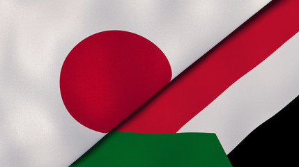 The flags of Japan and Sudan. News, reportage, business background. 3d illustration