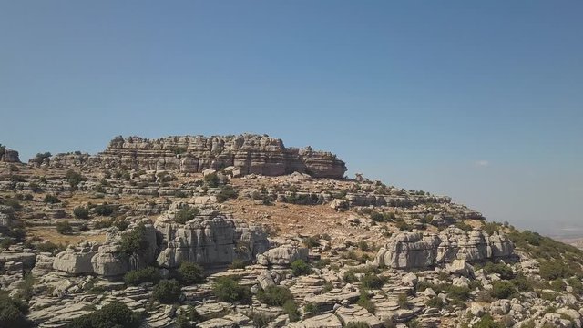 Panoramic aerial view of The Sierra del Torcal "El Torcal" montain in Antequera.  This rocks had their origin in the seabed during the Jurassic period, between 250 and 150 million years ago. Malaga