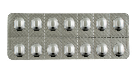 Metallic color medicine blister pack with divisible tablet sections, isolated on white background. Pills for treatment. - obrazy, fototapety, plakaty
