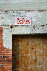 Workplace safety sign on old wall at historic Wychwood Barns TTC site Toronto