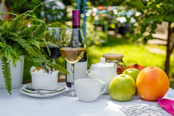 romantic picnic with wine and apples