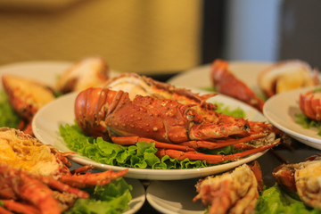 Seafood plate with lobster in a Vietnamese restaurant.