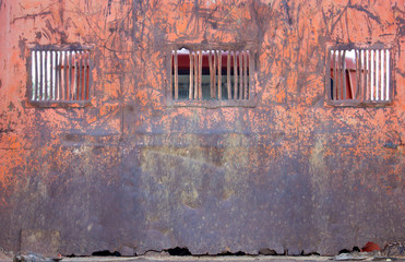 old brick wall with windows