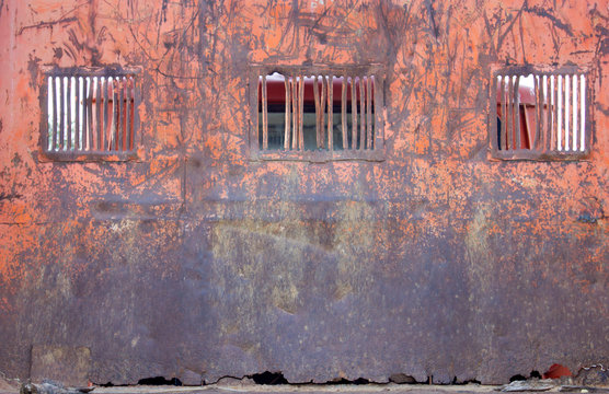 old brick wall with windows